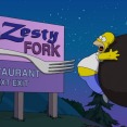 Homer is injured by the Zesty Fork billboard
